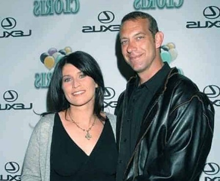 Aurora Andrus's parents Nancy McKeon and Marc Andrus posing for a photoshoot